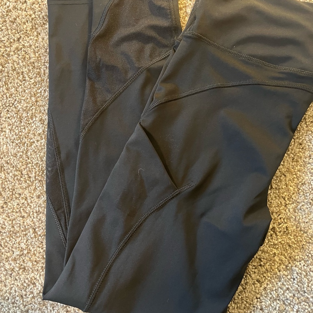 All in Motion Black Performance Leggings featuring side phone pockets. Size M